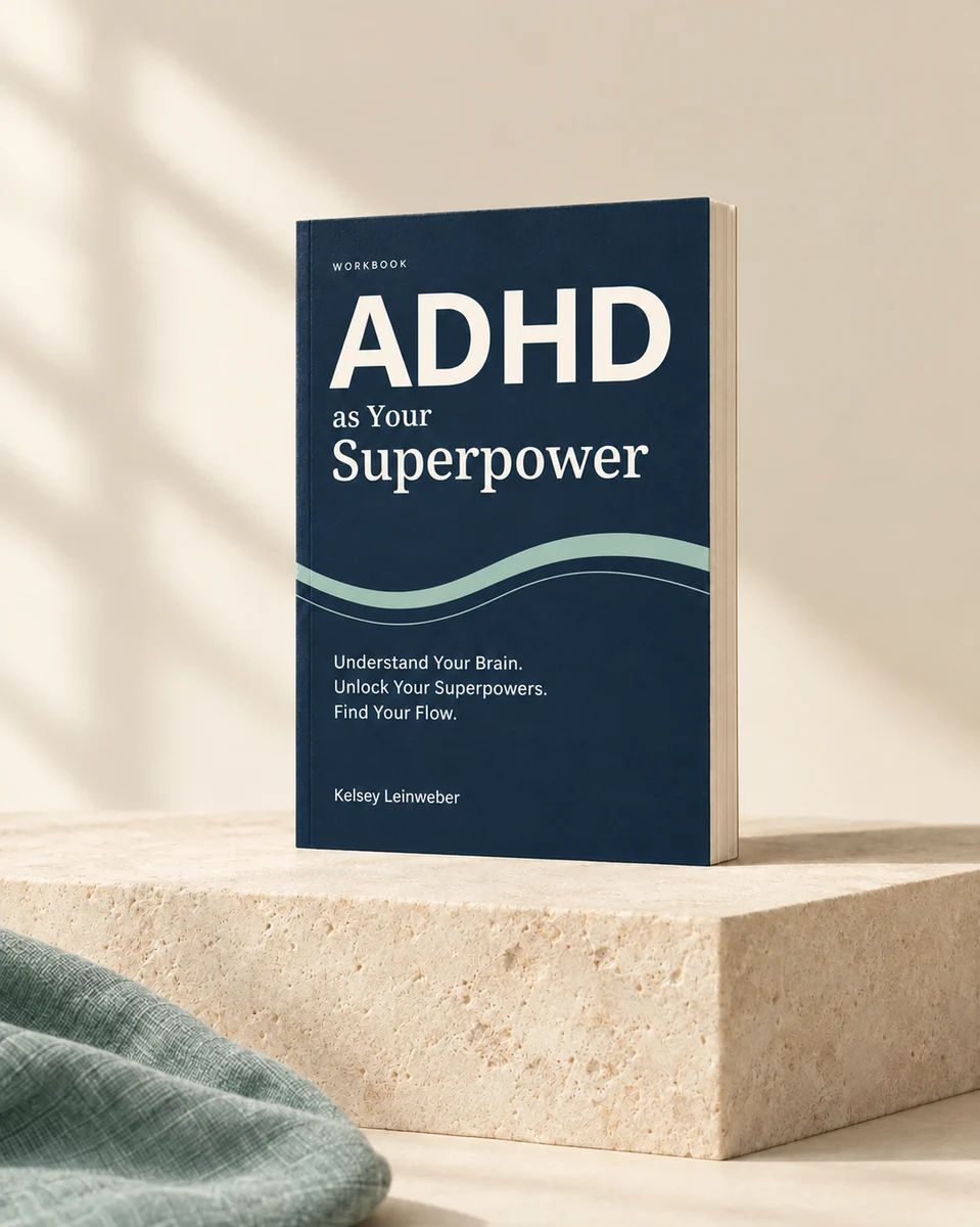 ADHD as Your Superpower by Kelsey Leinweber, shown on a stone pedestal. Understand Your Brain. Unlock Your Superpowers. Find Your Flow. Styled book mockup.